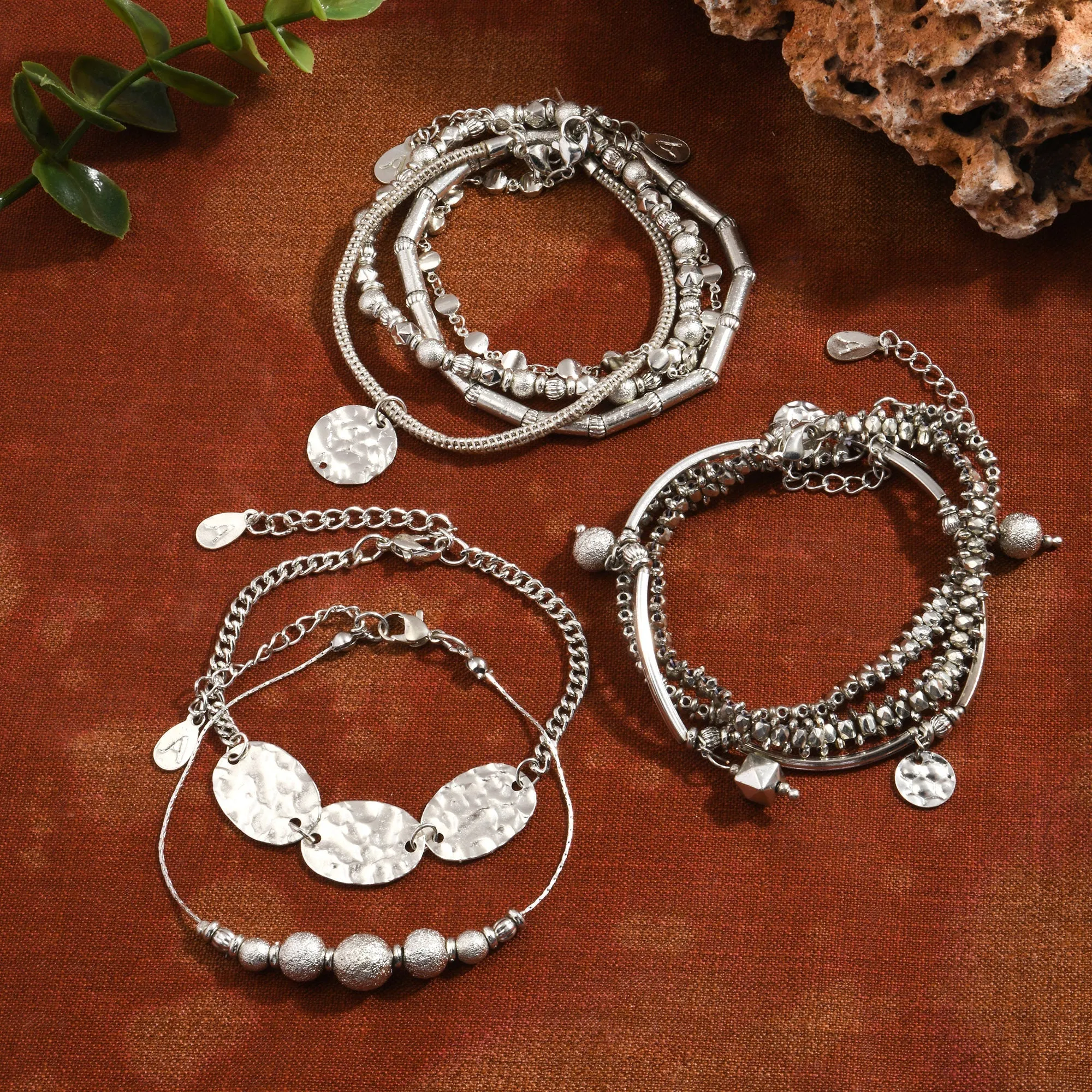 Accessorize London  Women's Silver Disc Stretch Bracelets Set Of 9