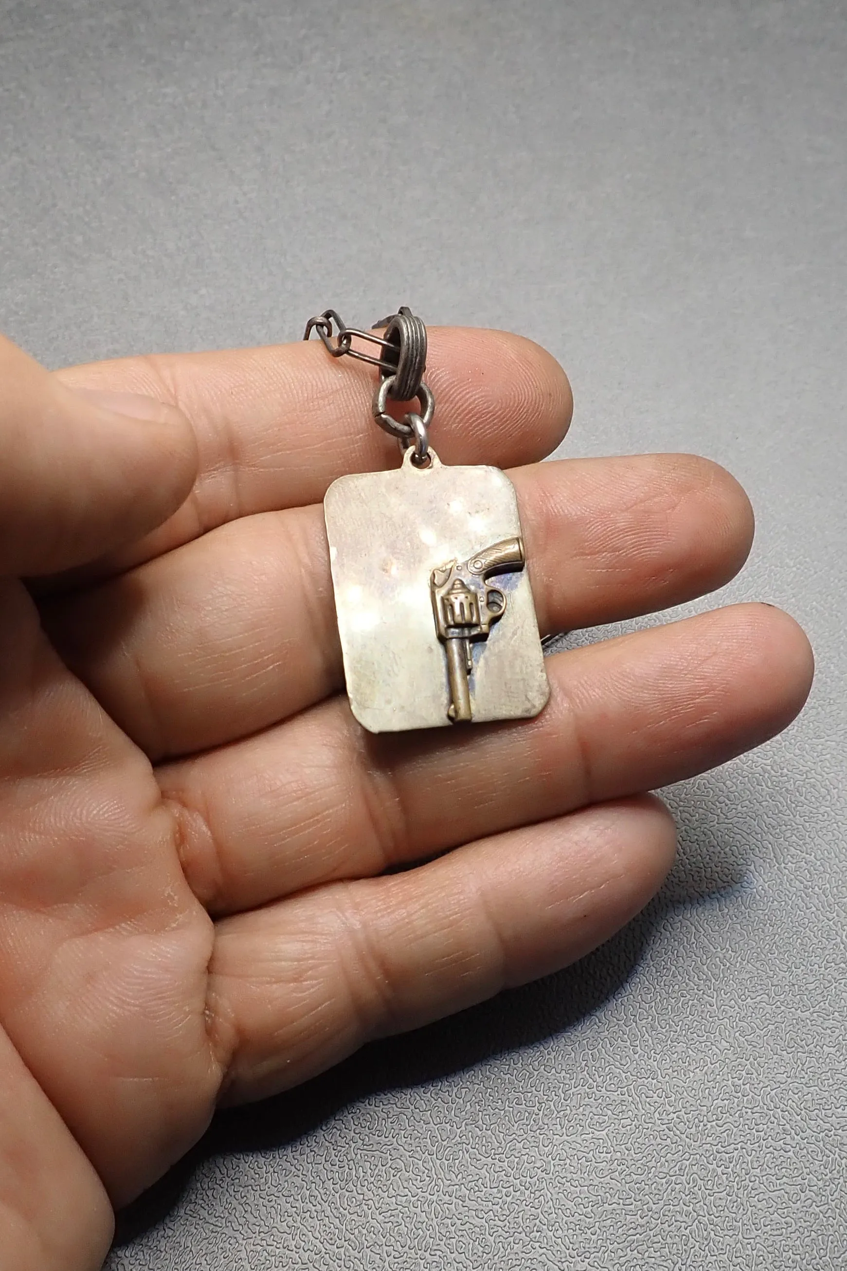 REVOLVER TAG PENDANT